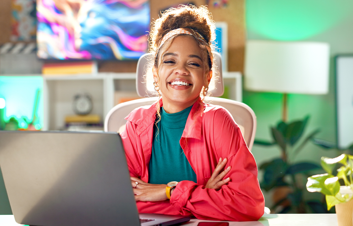 Young Professional Sitting Behind Laptop