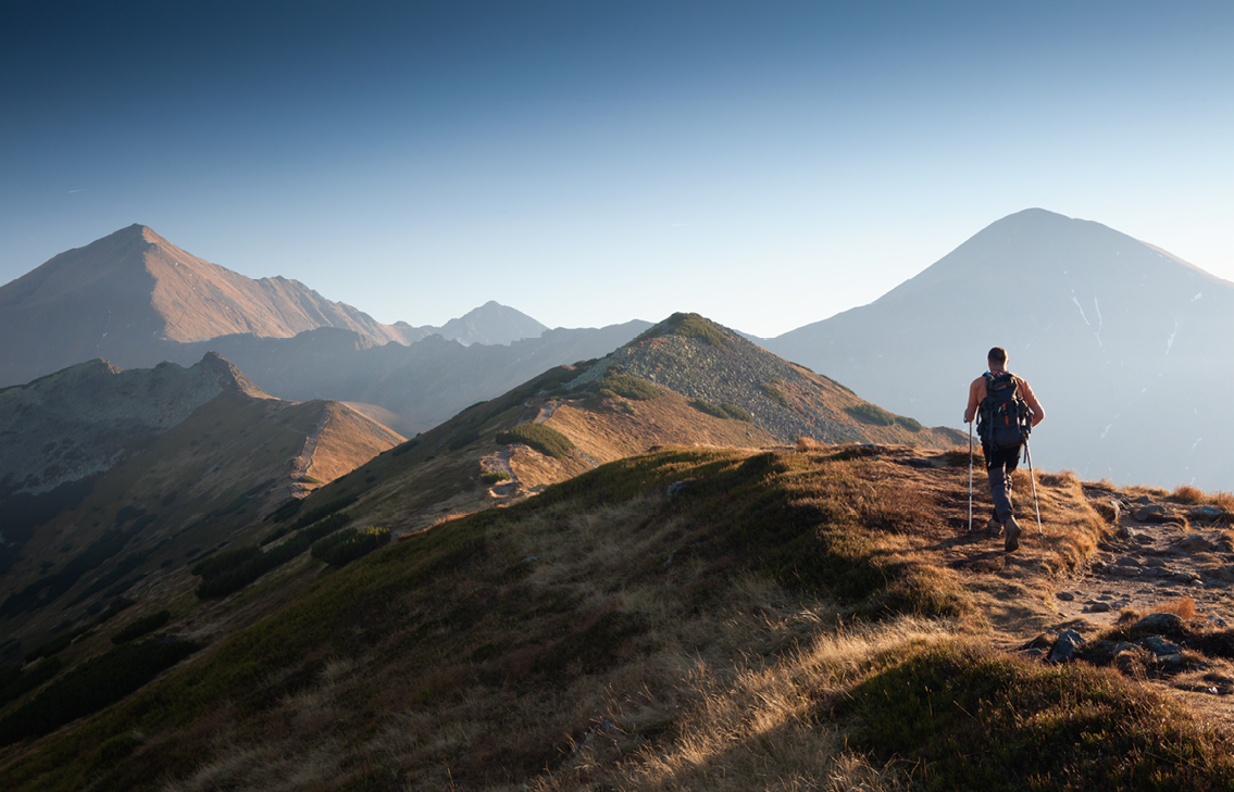 Person Hiking Mountains