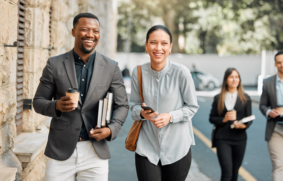 Two Coworkers Walking Outside