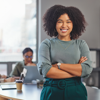 smiling female standing in office