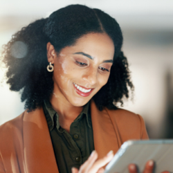 female walking in office using tablet